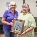 Pictured presenting the award to Joyce Woods is Gibbon Lions President, Sue Bentz. (Submitted photo)