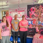 The Gibbon Post Office Staff (pictured from left) Postmaster Annette, Carriers Jay and Layla and Clerk Alicia went all in this month in their efforts to raise awareness and sell stamps during October’s Breast Cancer Awareness campaign and contest.