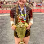 Reagyn Kleinschmidt of Morgan poses with her volleyball team’s National Championship trophy in Orlando, Florida last month. (Submitted photo)