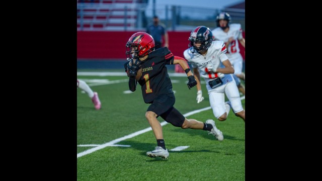 GFW sophomore wide receiver Colten Miller carries the ball down the field during the Firebirds’ game against St. James on Friday, September 11th. (Photo by ChrisRuizPhotos.)