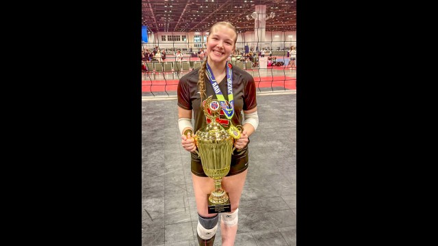 Reagyn Kleinschmidt of Morgan poses with her volleyball team’s National Championship trophy in Orlando, Florida last month. (Submitted photo)